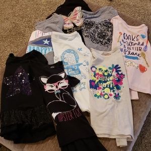 Lot of 8 size 7/8 Long sleeve shirts.